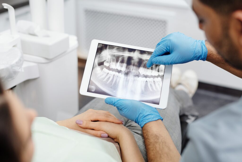 Dentist reviewing xrays